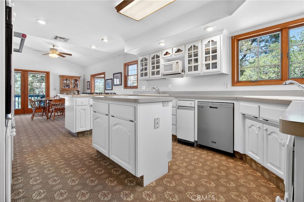 15185 Rancheria Creek Road Caliente, CA 93518 - Photo 7 of 54 a kitchen with cabinets a sink and appliances