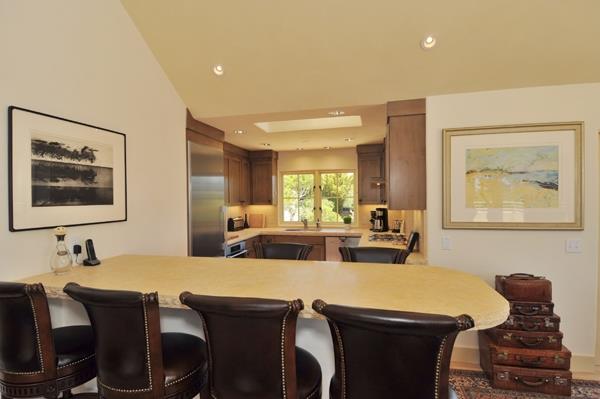 1600 Viscaino Road Pebble Beach, CA 93953 - Photo 9 of 11 a view of a dining room with furniture and window