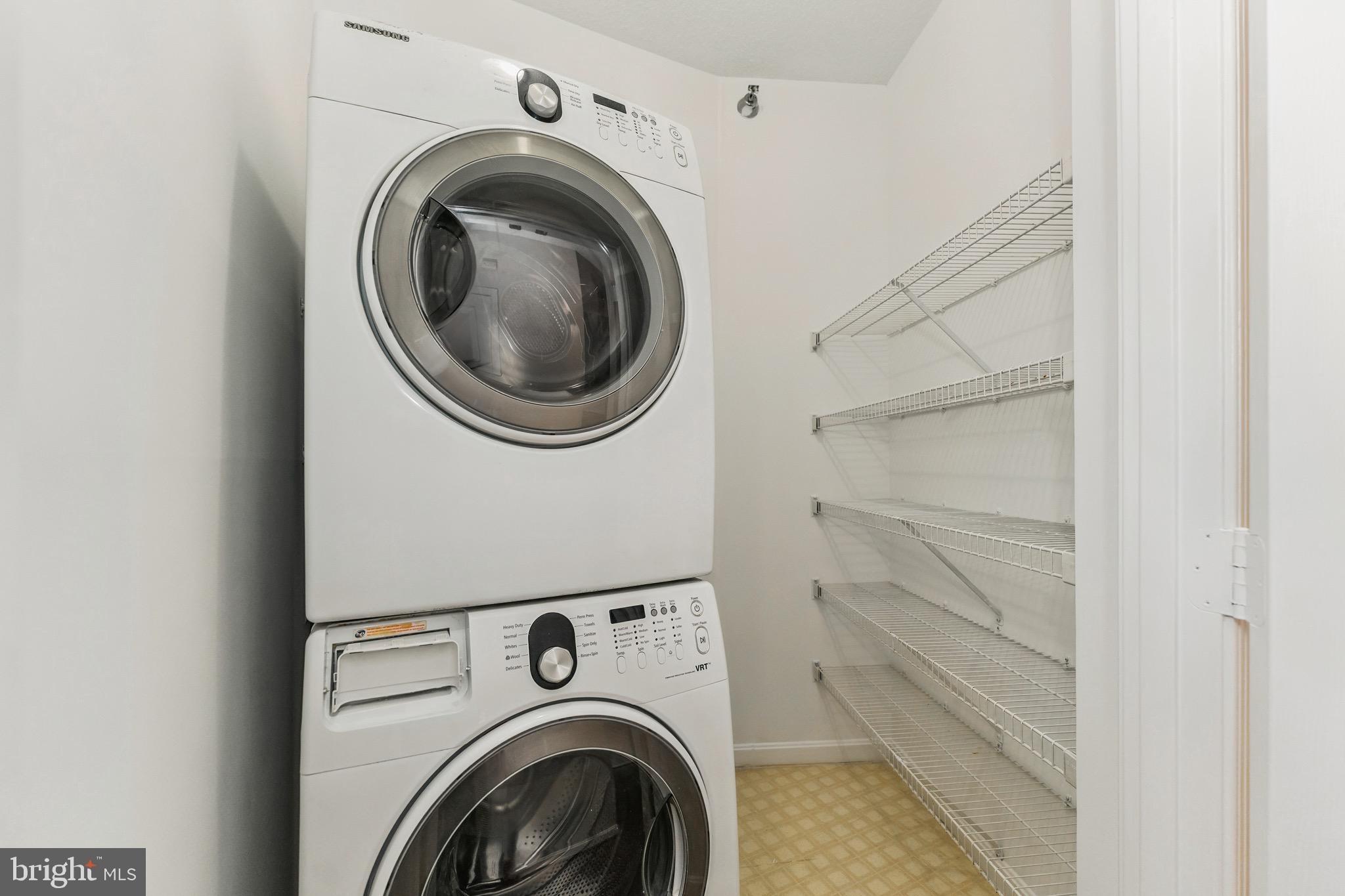 2900 North Leisure World Boulevard, Unit 209 Silver Spring, MD 20906 - Photo 24 of 24 a utility room with dryer and washer