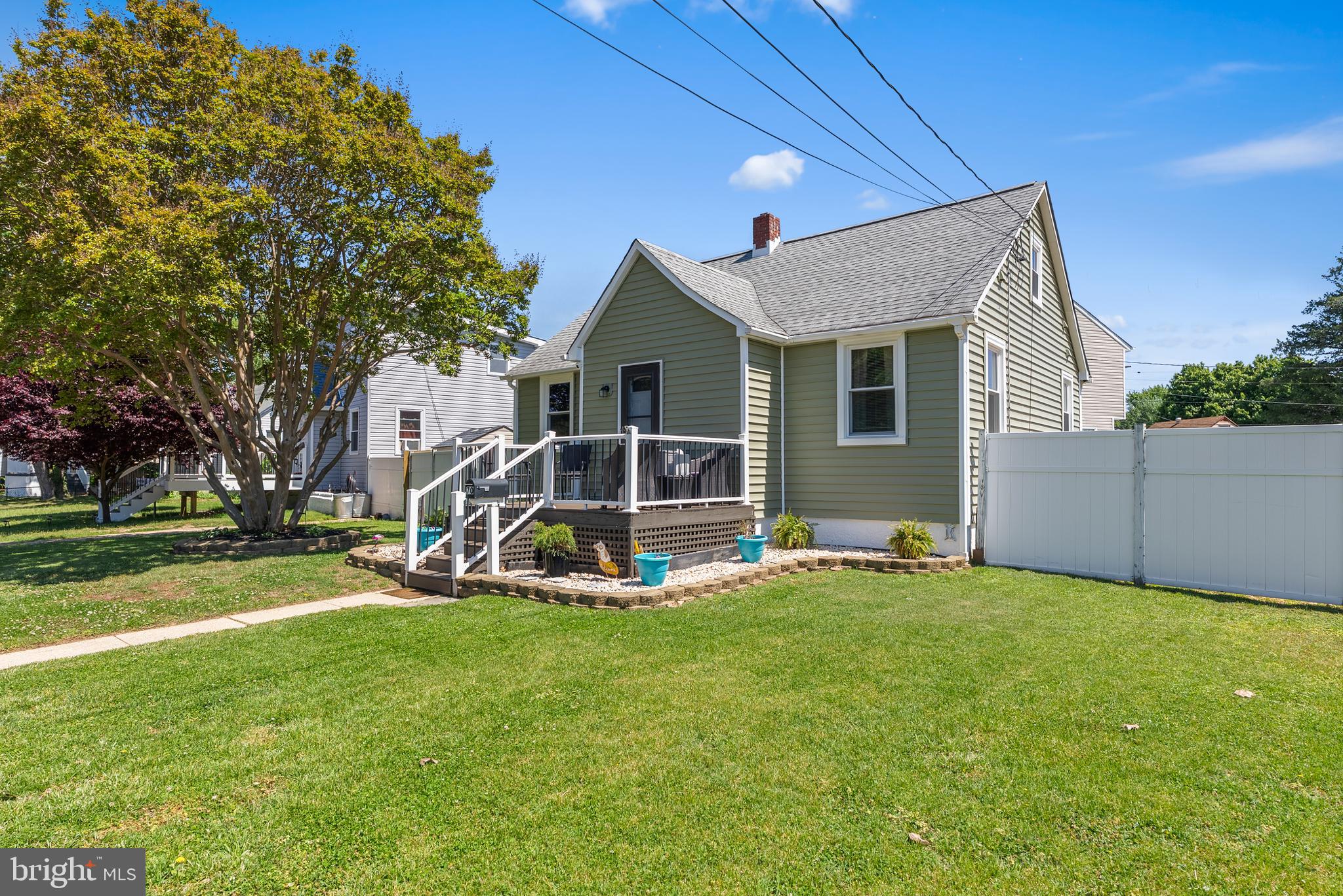 70 Del Rio Road Baltimore, MD 21222 - Photo 2 of 40 a view of a house with a yard and sitting area