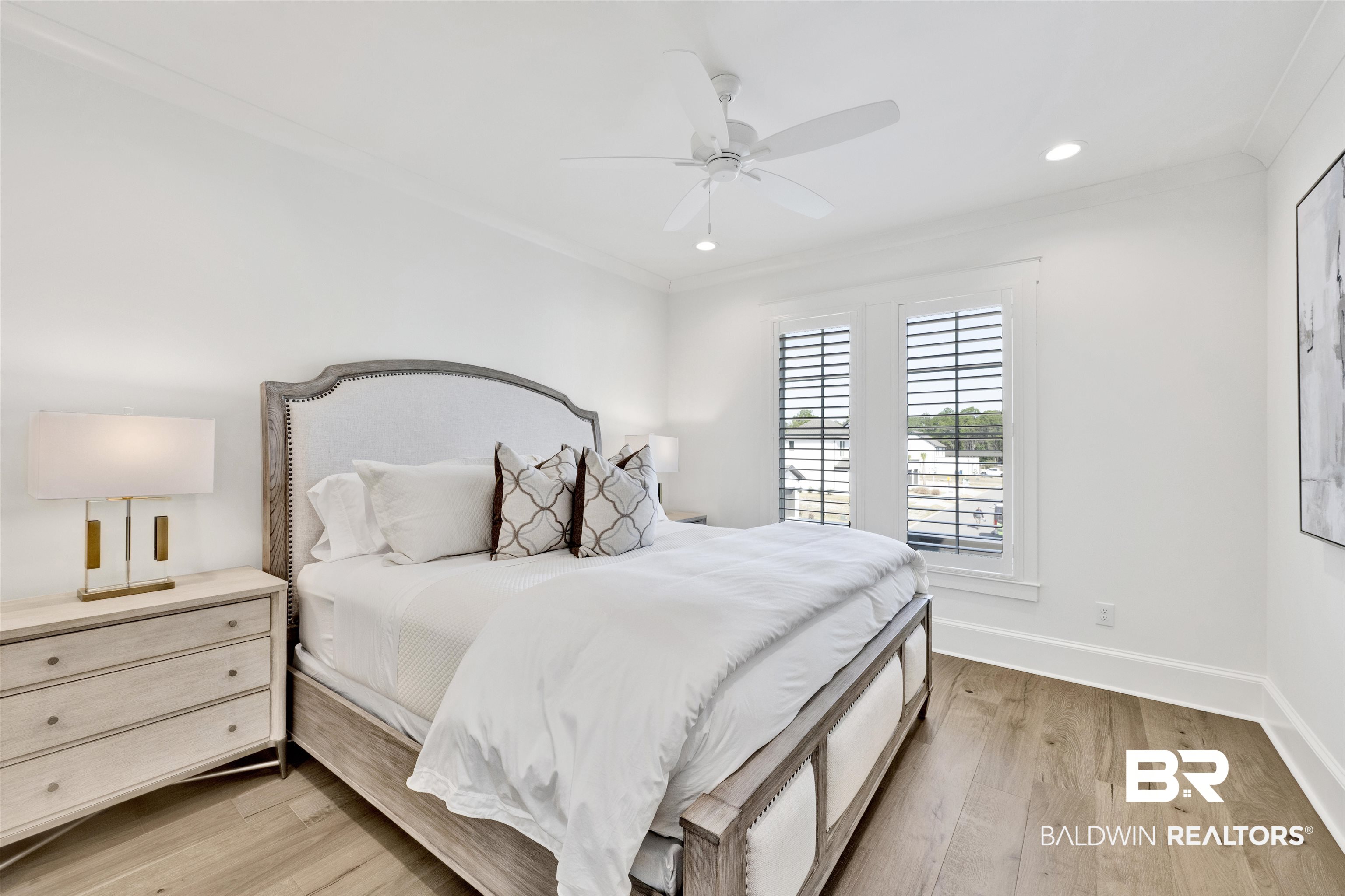 861 Inlet Circle Gulf Shores, AL 36542 - Photo 32 of 54 Bedroom featuring light wood-style floors, a ceiling fan, ornamental molding, and recessed lighting