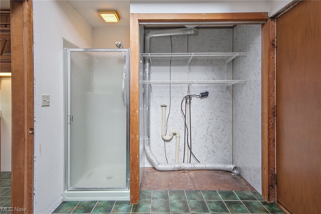 2753 Tabor Ridge Road Northeast Mineral City, OH 44656 - Photo 21 of 41 Bathroom with walk in shower and tile flooring