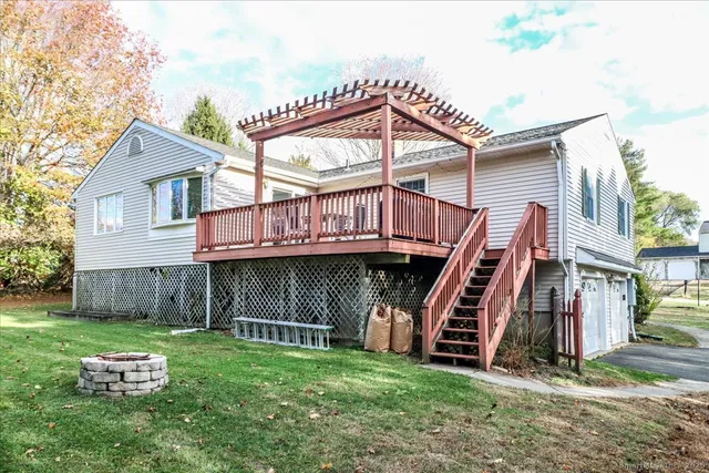 a view of a balcony with wooden floor