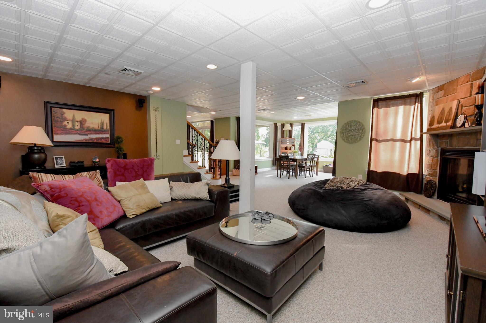 400 Baileys Run Springfield, PA 19064 - Photo 46 of 64 Lower Level Family Space with Fireplace