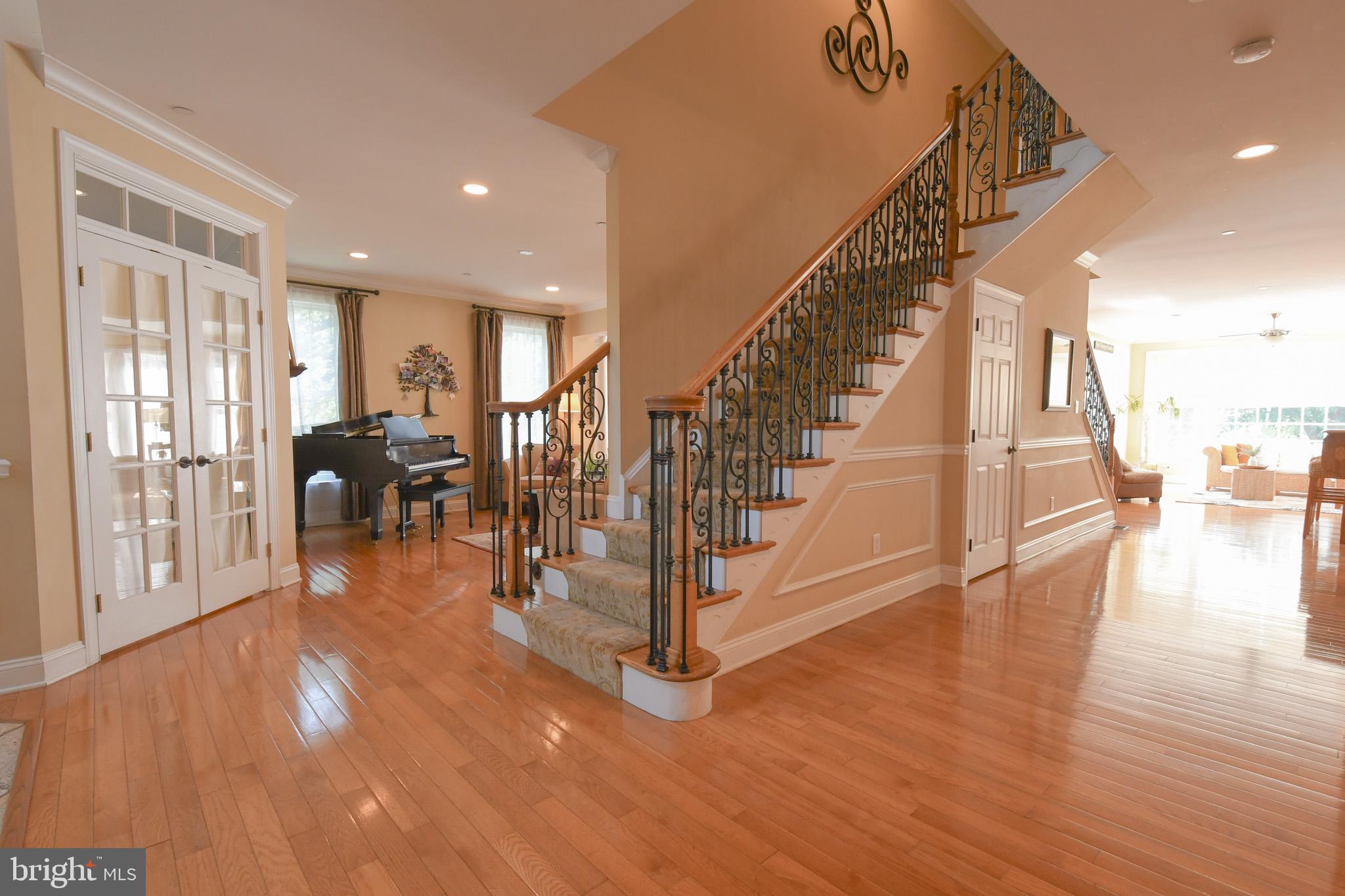 400 Baileys Run Springfield, PA 19064 - Photo 6 of 64 Staircase with Intricate Wrought Iron Details