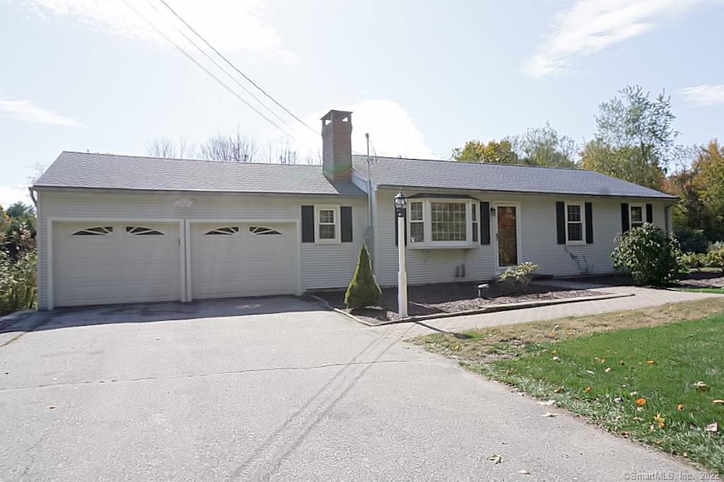 43 Mansfield Road Harwinton, CT 06791 - Photo 1 of 1 Front view shows 2 car garage and large driveway for extra parking.