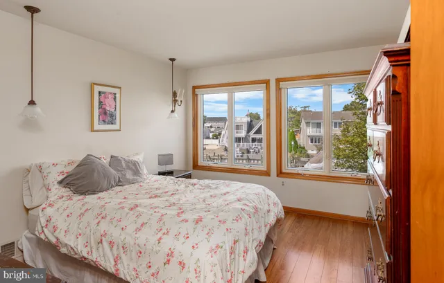 an aerial view of a house with a lake view