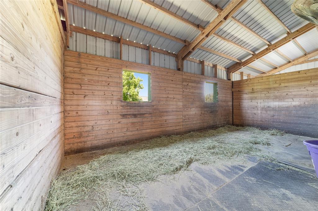 16490 Northwest 122nd Terrace Reddick, FL 32686 - Photo 15 of 24 a view of a backyard