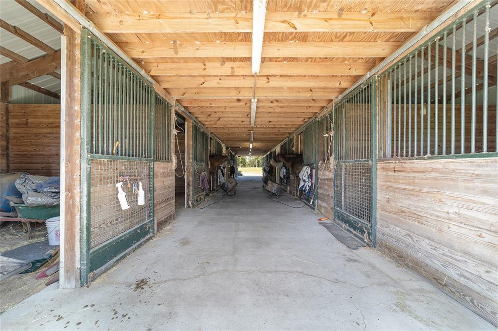16490 Northwest 122nd Terrace Reddick, FL 32686 - Photo 16 of 24 a view of a porch with furniture