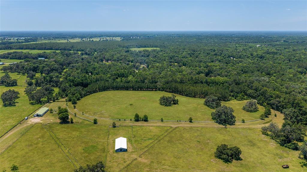 16490 Northwest 122nd Terrace Reddick, FL 32686 - Photo 23 of 24 a view of a swimming pool