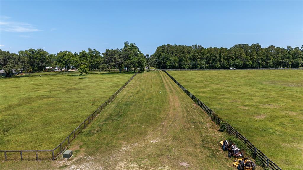 16490 Northwest 122nd Terrace Reddick, FL 32686 - Photo 5 of 24 a view of swimming pool with a yard