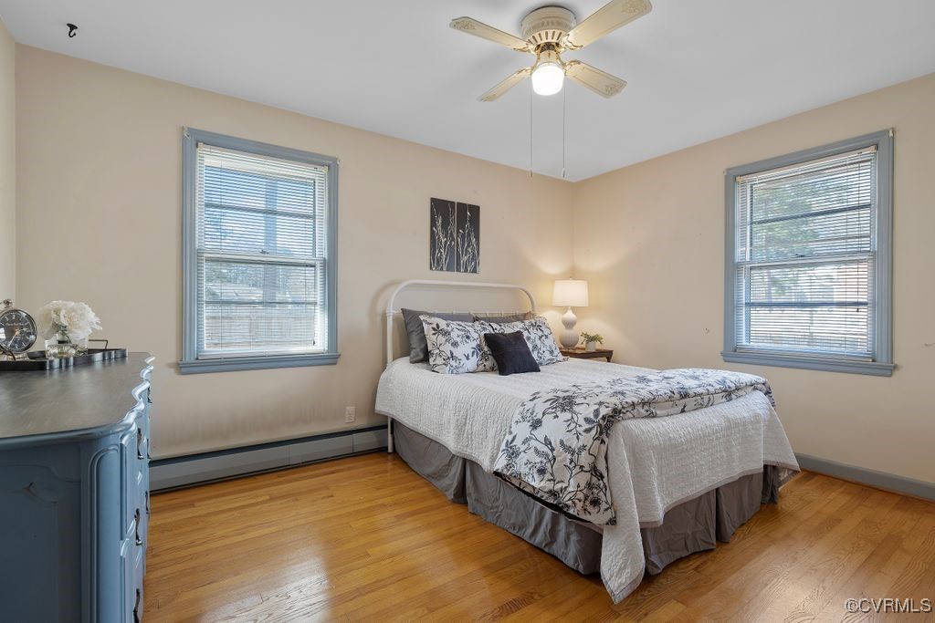 8406 Colebrook Road Richmond, VA 23227 - Photo 5 of 29 Primary bedroom with wood floors.