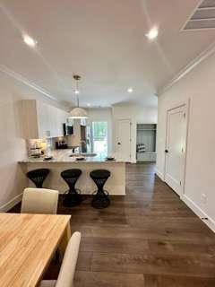 105 Chateau Drive Southeast Rome, GA 30161 - Photo 25 of 49 a open kitchen with white cabinets and stainless steel appliances
