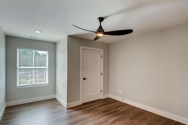a bathroom with a double vanity sink and mirror