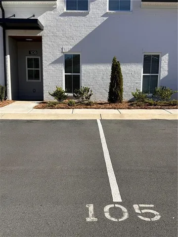 a view of house with outdoor space