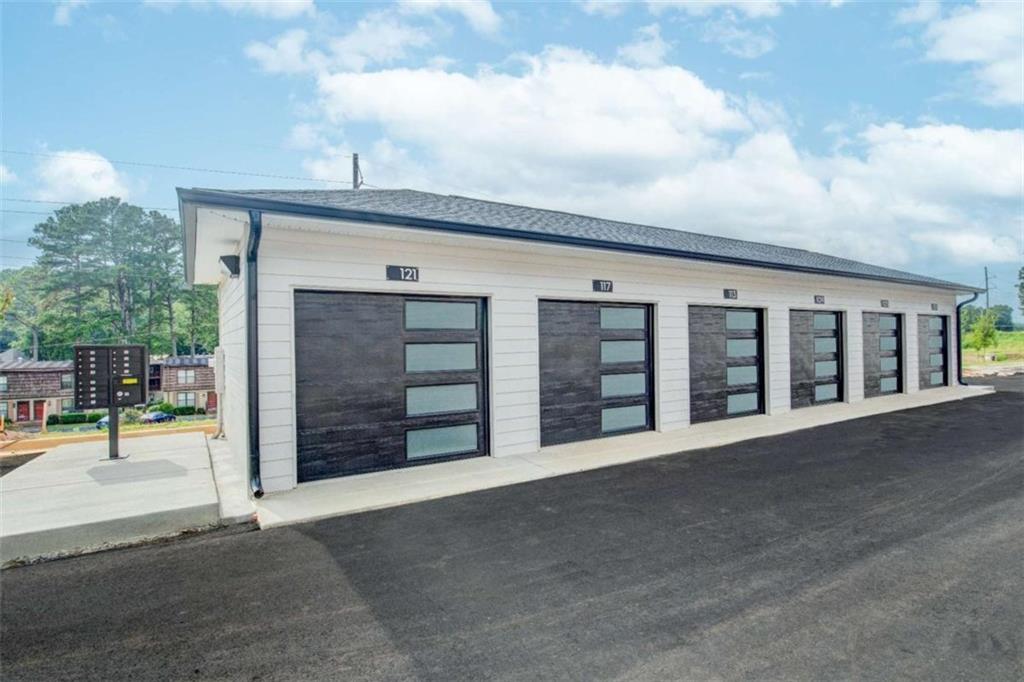 105 Chateau Drive Southeast Rome, GA 30161 - Photo 10 of 49 a view of a house with barbeque and wooden fence