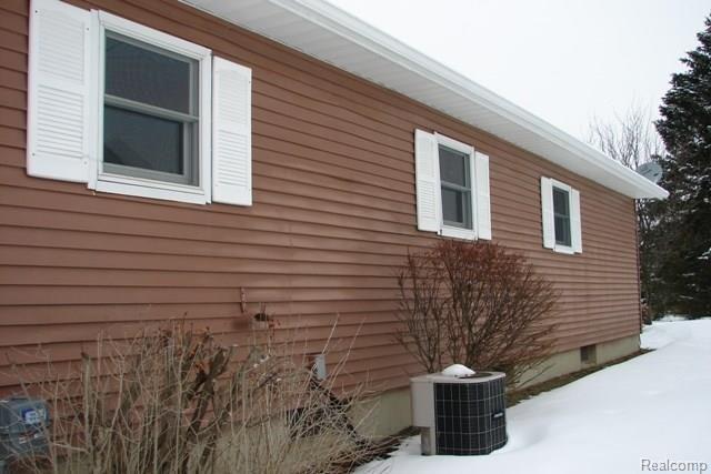 1426 Pebble Creek Road Metamora, MI 48455 - Photo 22 of 24 Central air.jpg