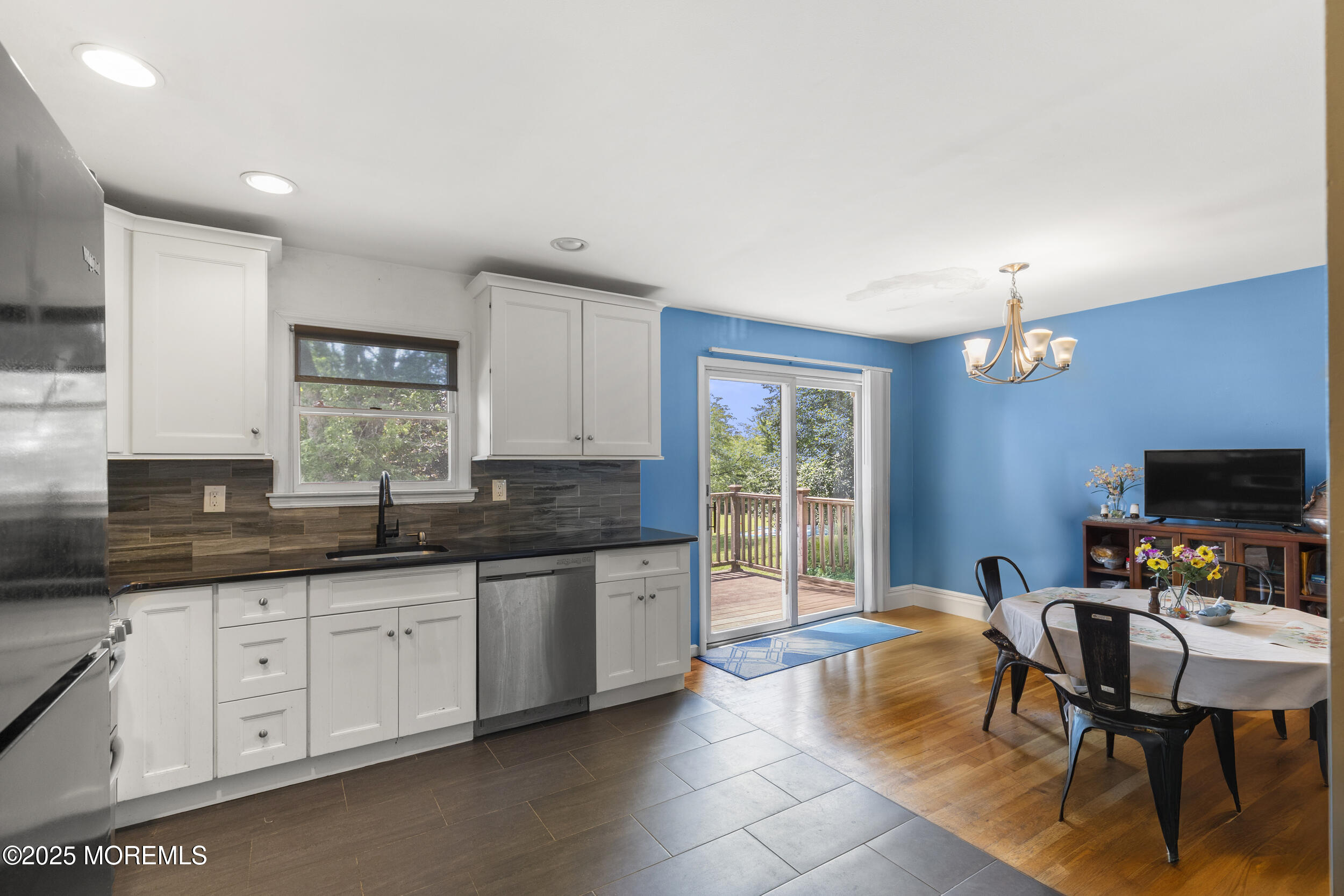 47 Valley Road Jackson, NJ 08527 - Photo 14 of 29 a kitchen with granite countertop a sink and cabinets