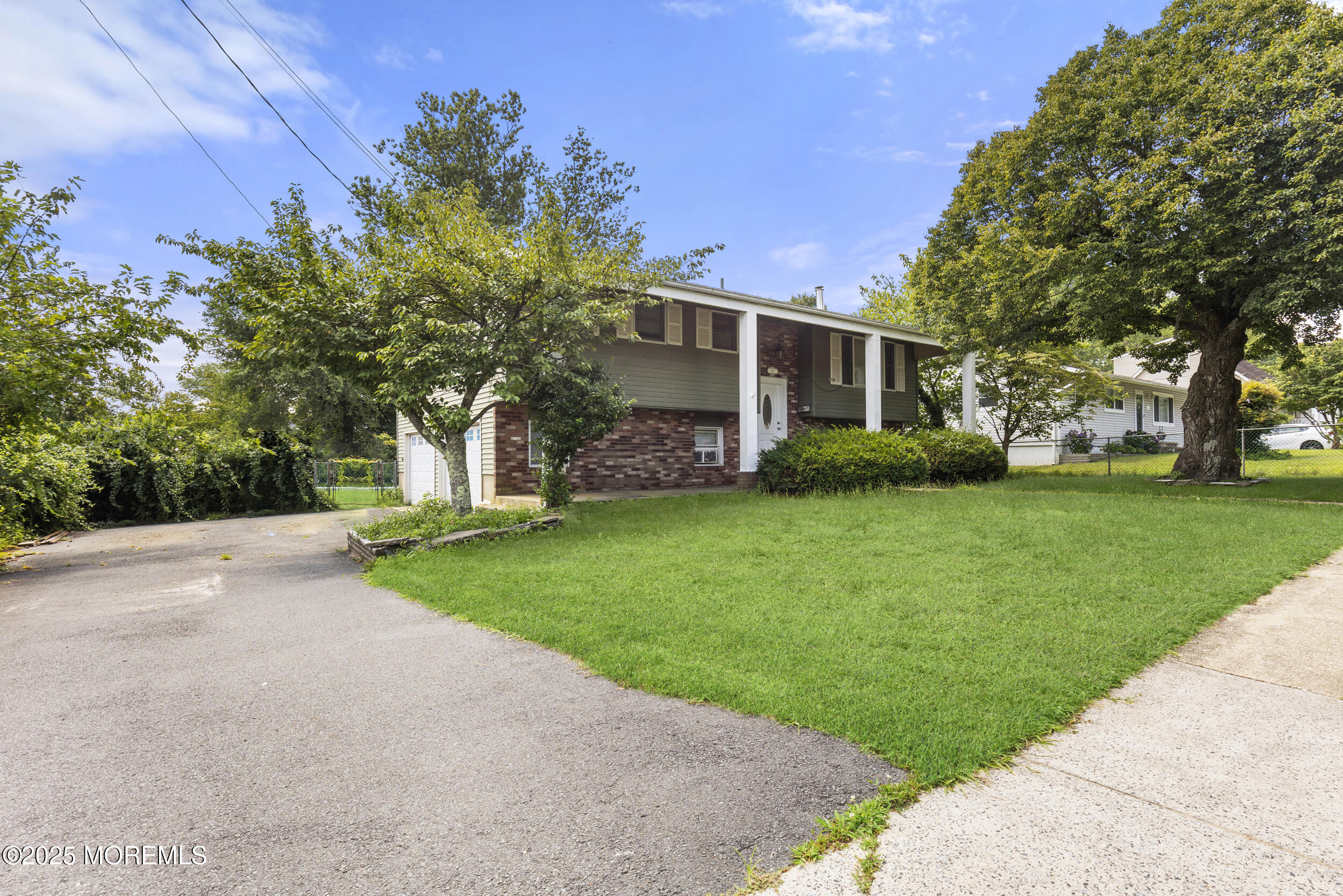 47 Valley Road Jackson, NJ 08527 - Photo 3 of 29 a front view of house with yard and green space