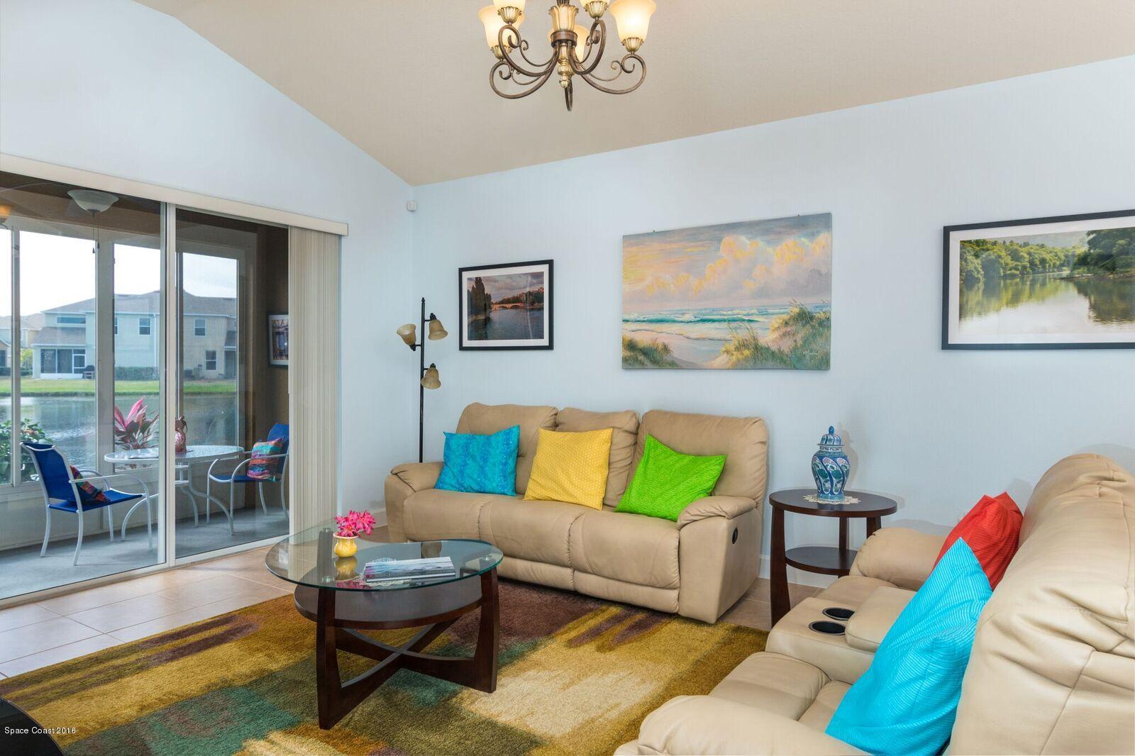 3480 Titanic Circle, Unit 84 Melbourne, FL 32903 - Photo 7 of 21 Living room w/ Sliders