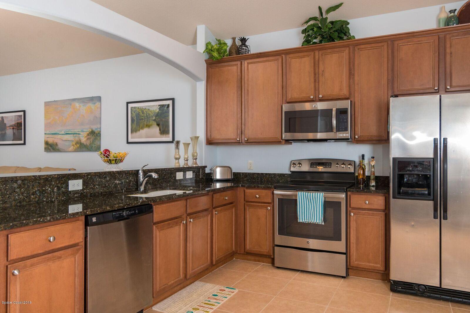 3480 Titanic Circle, Unit 84 Melbourne, FL 32903 - Photo 10 of 21 Kitchen 2