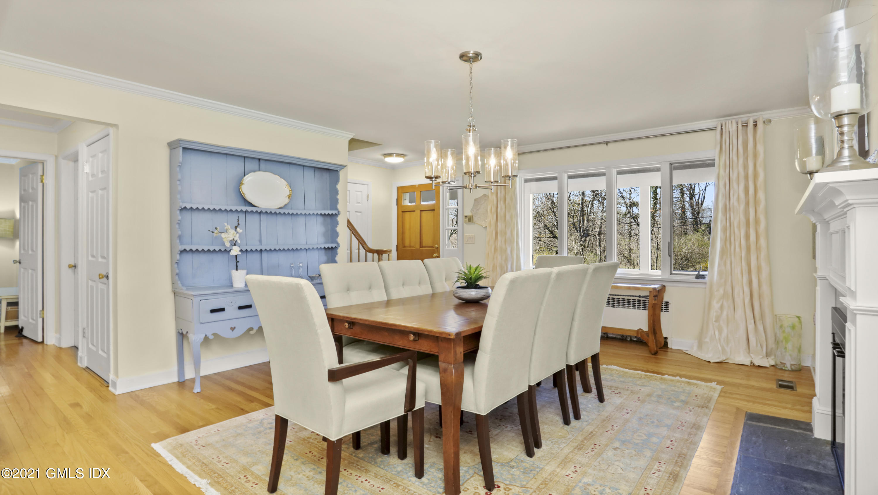 4 Norias Road Greenwich, CT 06830 - Photo 12 of 44 a view of a dining room with furniture window and wooden floor