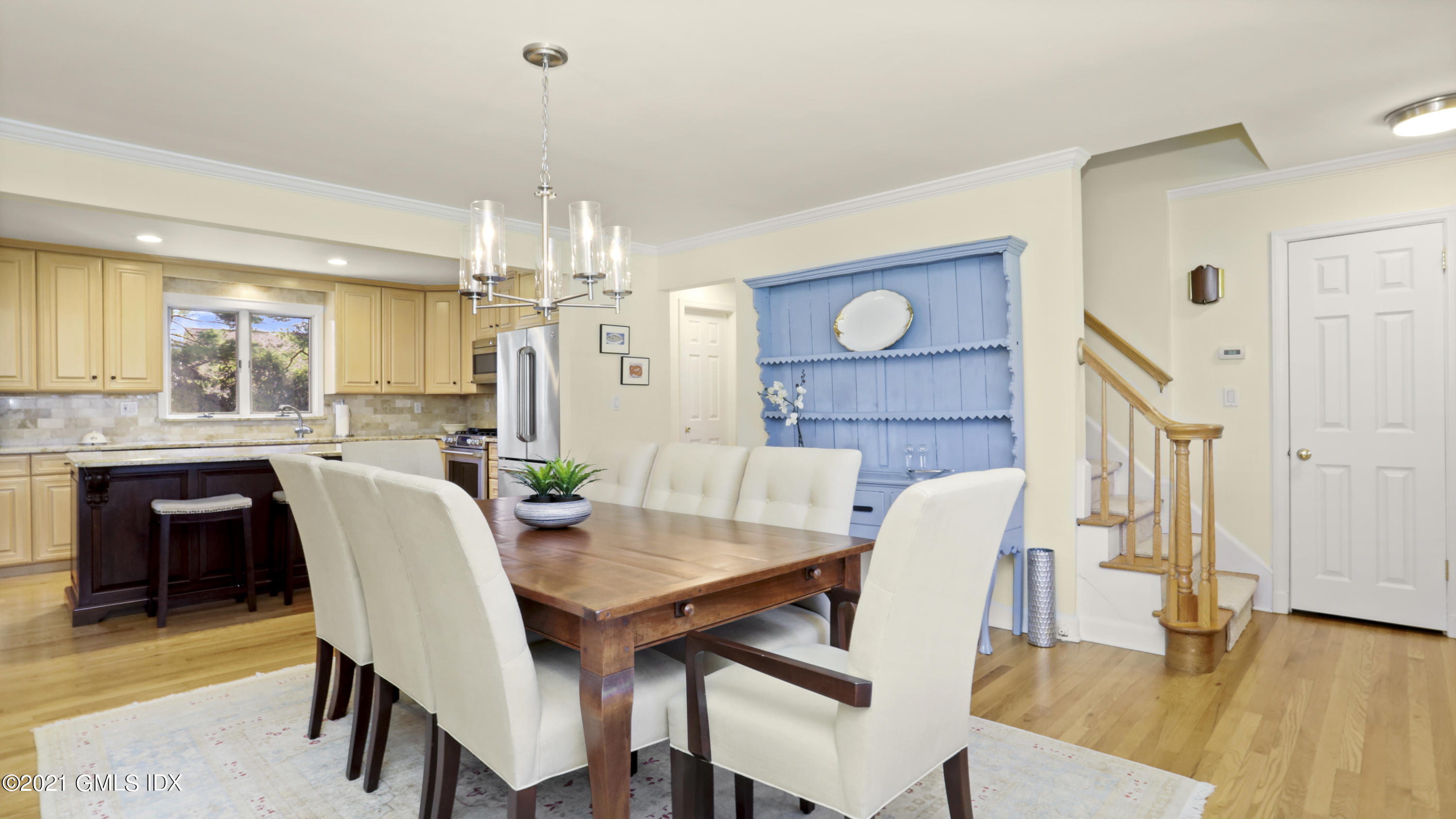 4 Norias Road Greenwich, CT 06830 - Photo 13 of 44 a view of a dining room with furniture and wooden floor