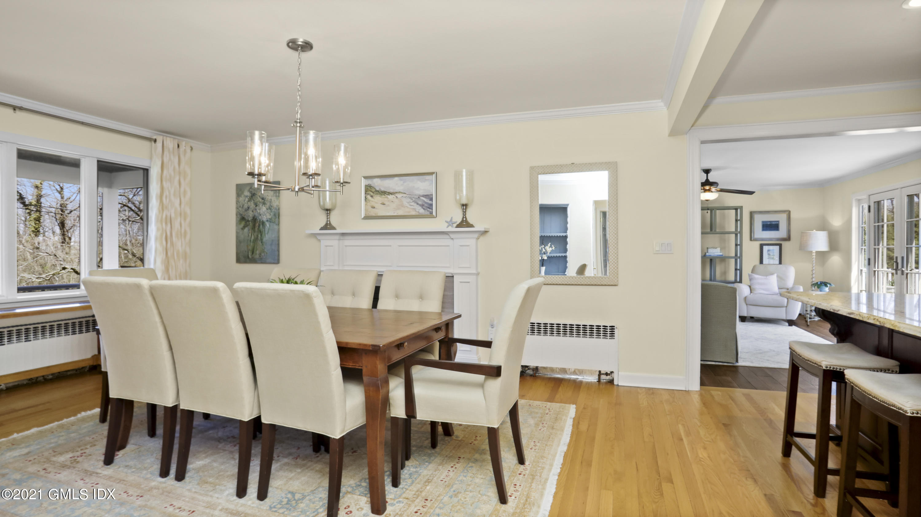 4 Norias Road Greenwich, CT 06830 - Photo 15 of 44 a view of a dining room with furniture and wooden floor