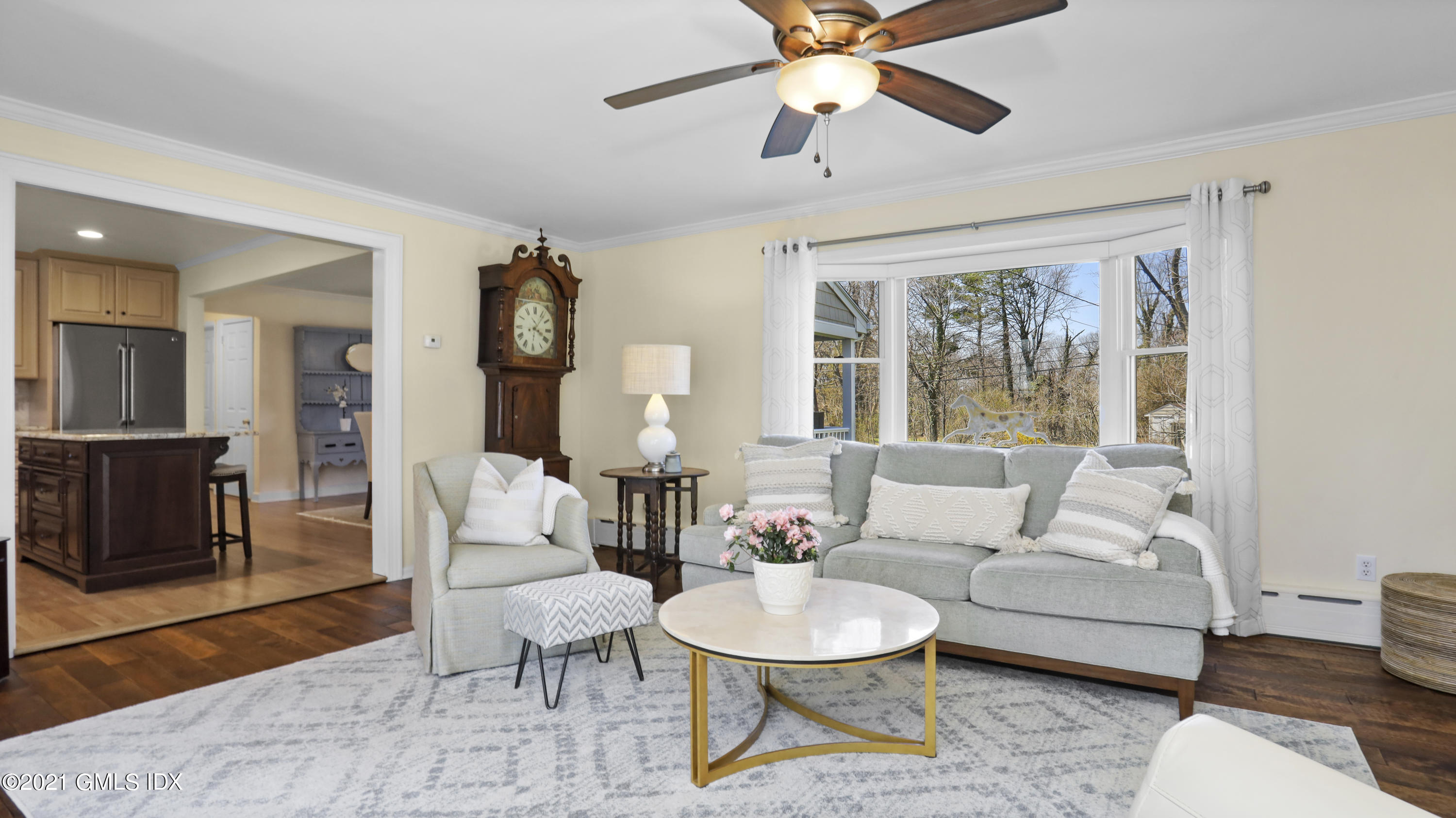 4 Norias Road Greenwich, CT 06830 - Photo 20 of 44 a living room with furniture and a large window