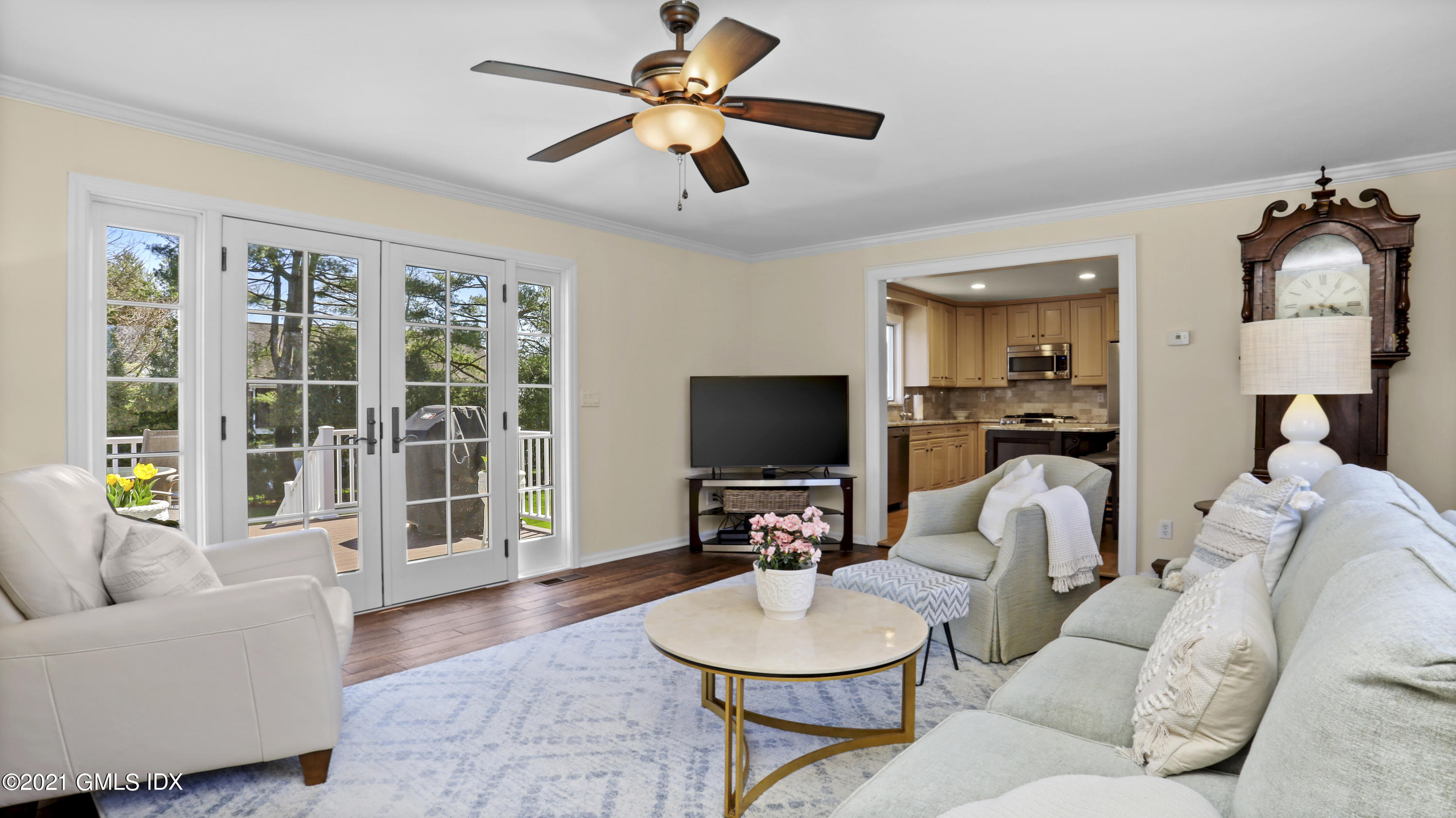 4 Norias Road Greenwich, CT 06830 - Photo 21 of 44 a living room with furniture and a flat screen tv