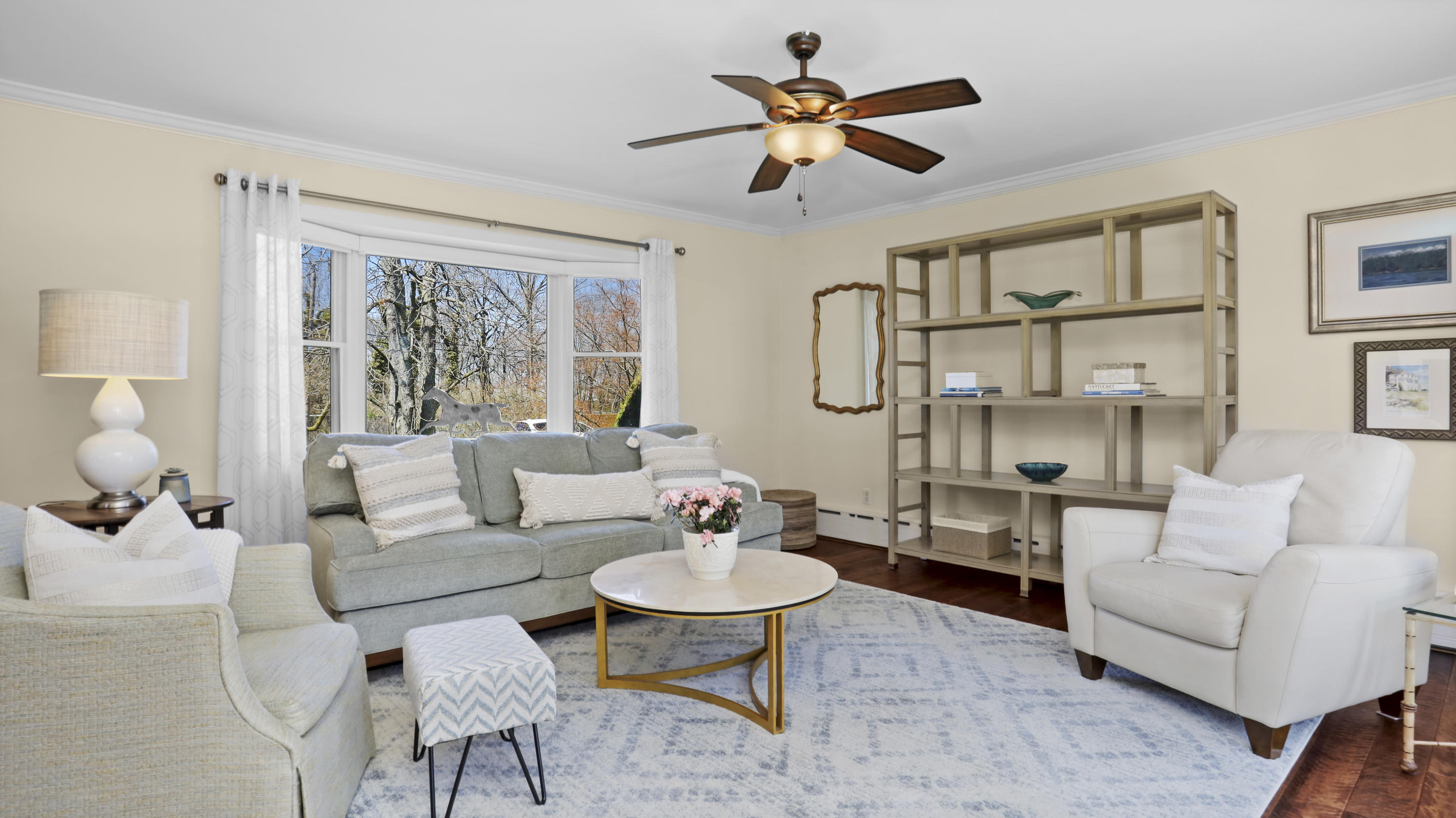 4 Norias Road Greenwich, CT 06830 - Photo 23 of 44 a living room with furniture potted plant and a chandelier