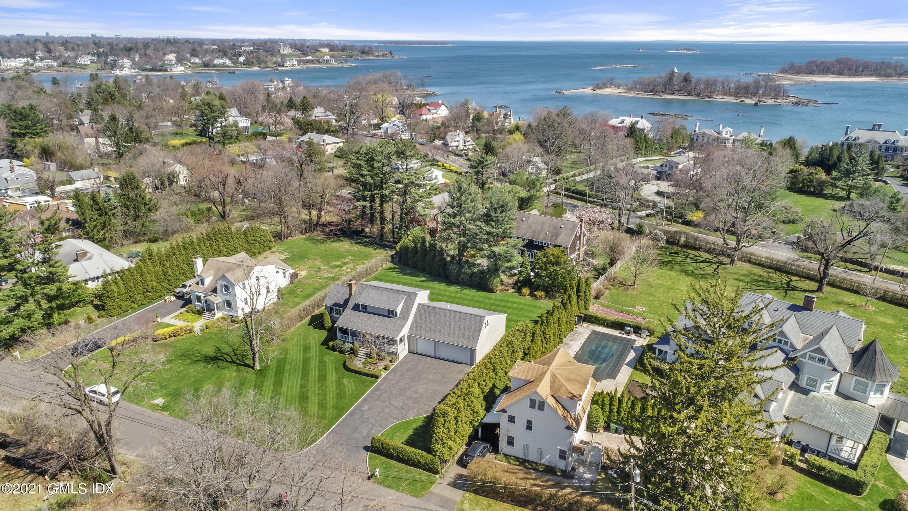 4 Norias Road Greenwich, CT 06830 - Photo 6 of 44 an aerial view of a house with a lake view