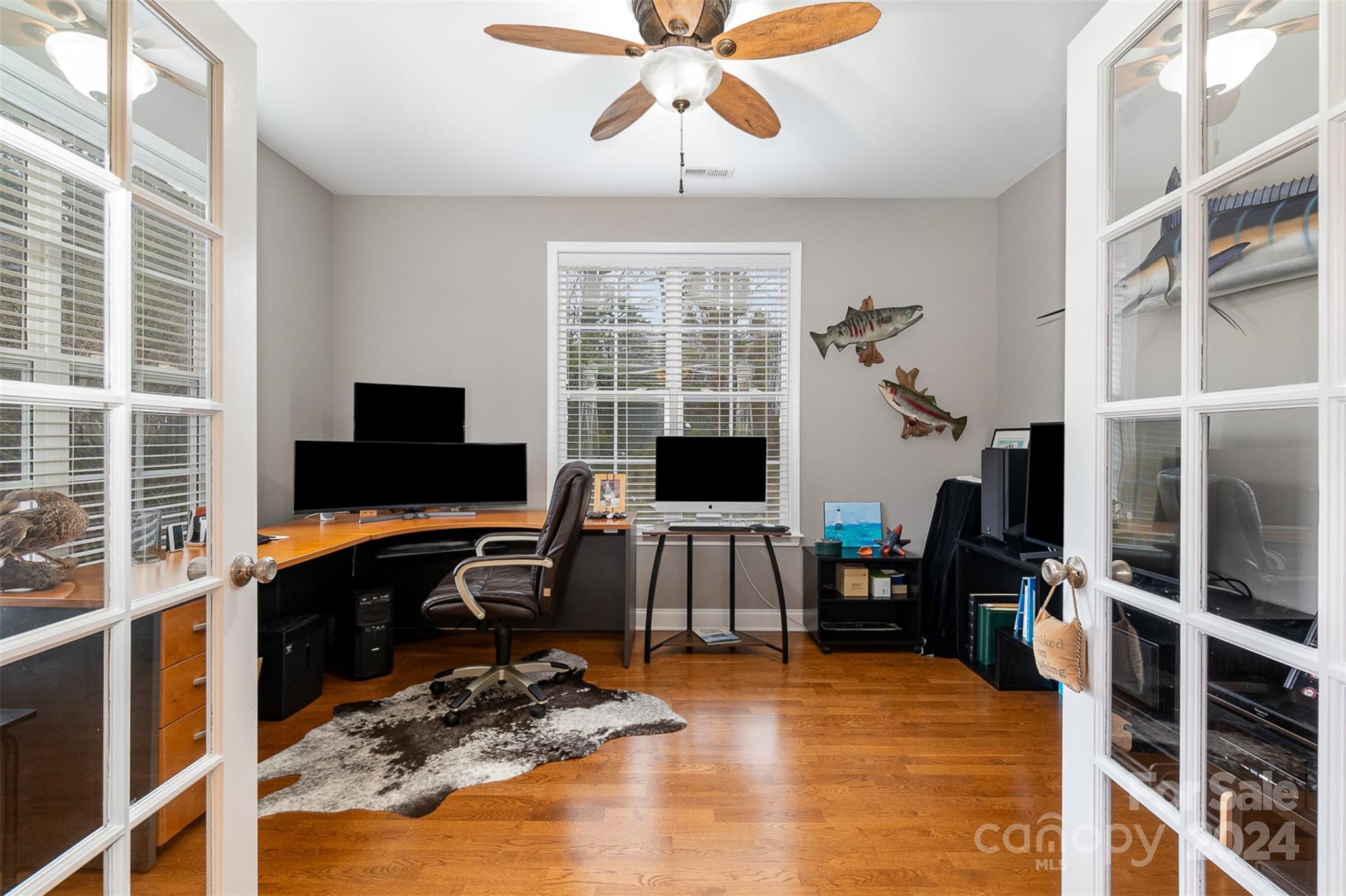 8653 Edinburgh Square Drive Cornelius, NC 28031 - Photo 14 of 22 a view of a livingroom with workspace and a window