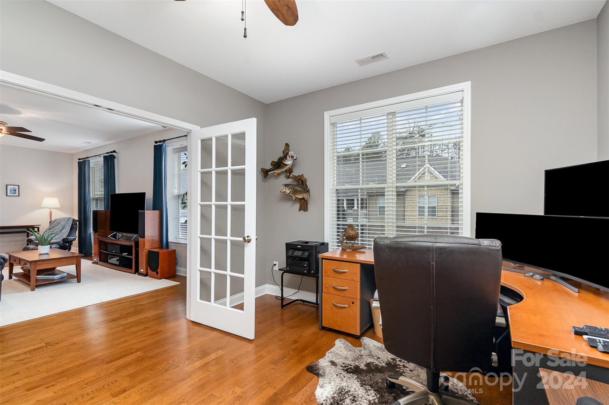 8653 Edinburgh Square Drive Cornelius, NC 28031 - Photo 15 of 22 a livingroom with workspace and a window
