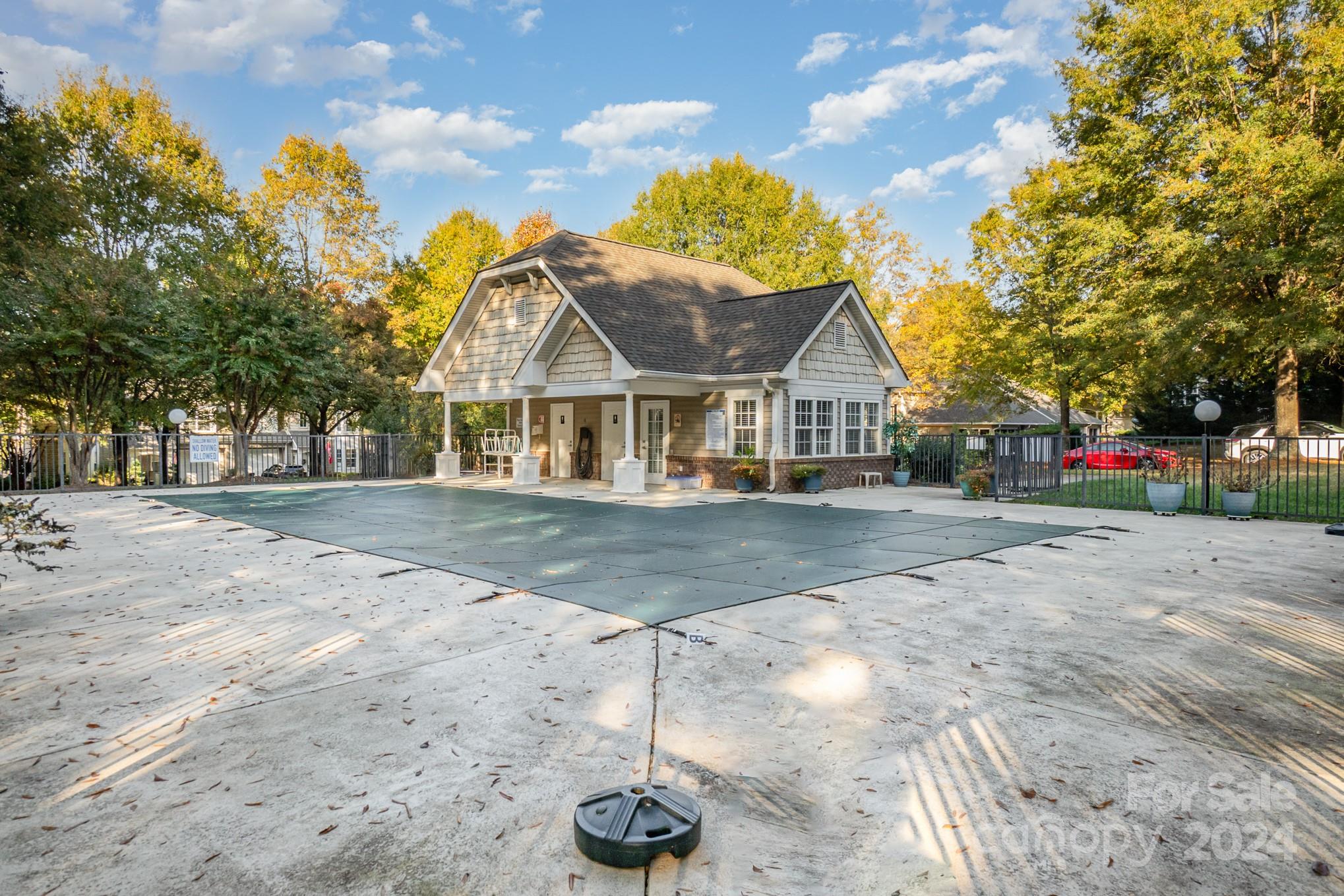 8653 Edinburgh Square Drive Cornelius, NC 28031 - Photo 21 of 22 a front view of a house with a yard
