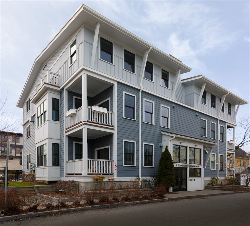 11 Tannery Brook Row, Unit 3 Somerville, MA 02144 - Photo 20 of 20 a front view of a building