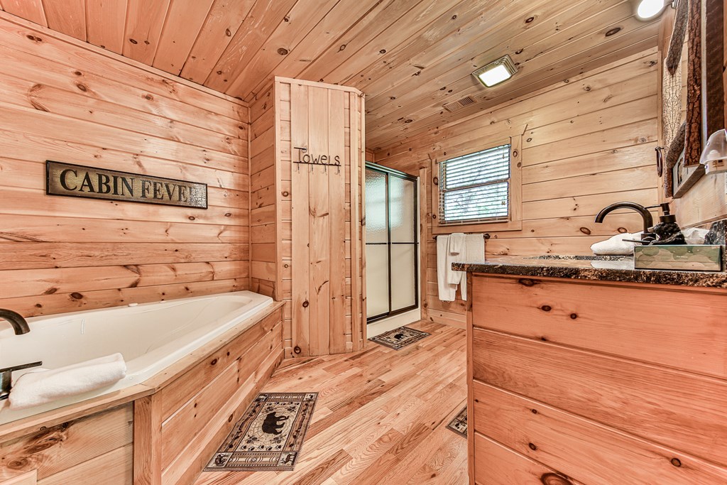 88 Black Gum Lane Blue Ridge, GA 30513 - Photo 31 of 85 a bathroom with a sink and a bathtub