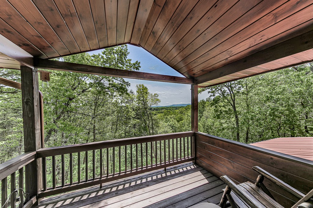 88 Black Gum Lane Blue Ridge, GA 30513 - Photo 34 of 85 a view of a balcony with wooden floor