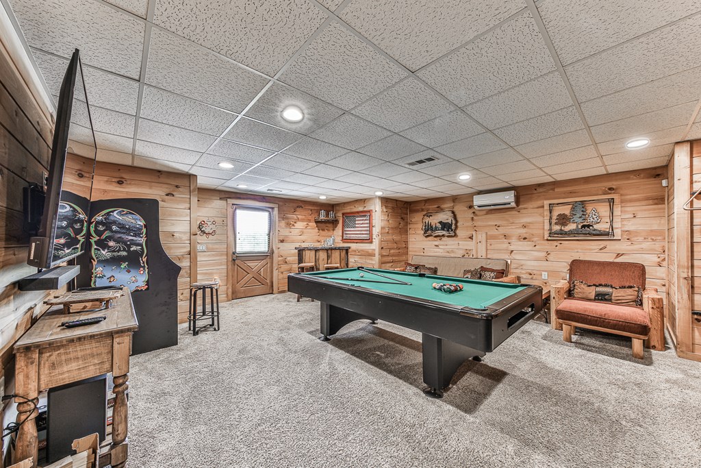 88 Black Gum Lane Blue Ridge, GA 30513 - Photo 42 of 85 a room with furniture and a flat screen tv