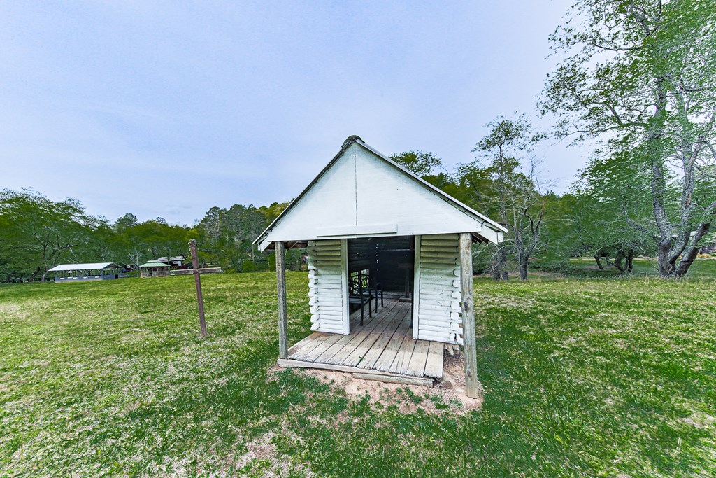 88 Black Gum Lane Blue Ridge, GA 30513 - Photo 70 of 85 a view of a house with a yard and sitting area