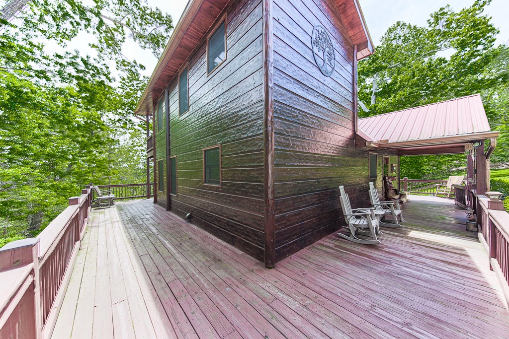 88 Black Gum Lane Blue Ridge, GA 30513 - Photo 7 of 85 a view of a patio with a table and chairs