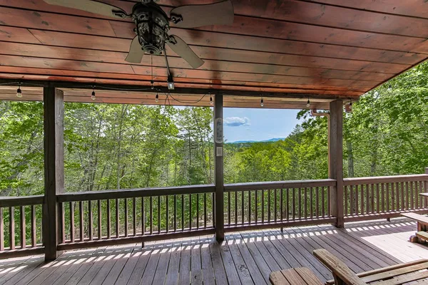 a view of a two chairs in the balcony