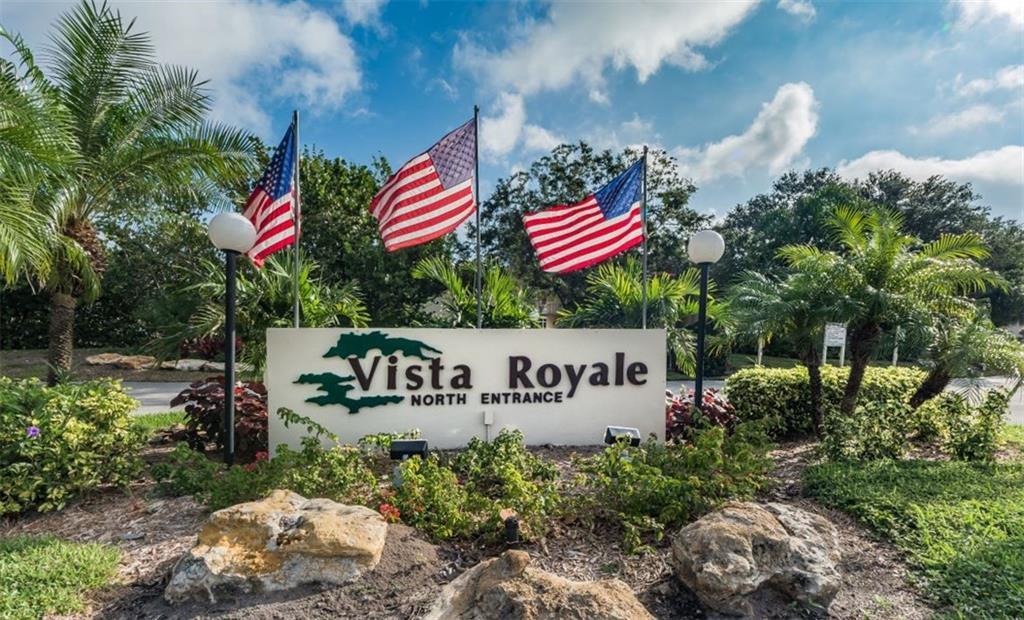 1 Vista Palm Lane, Unit 207 Vero Beach, FL 32962 - Photo 36 of 36 a sign that is on the side of the road