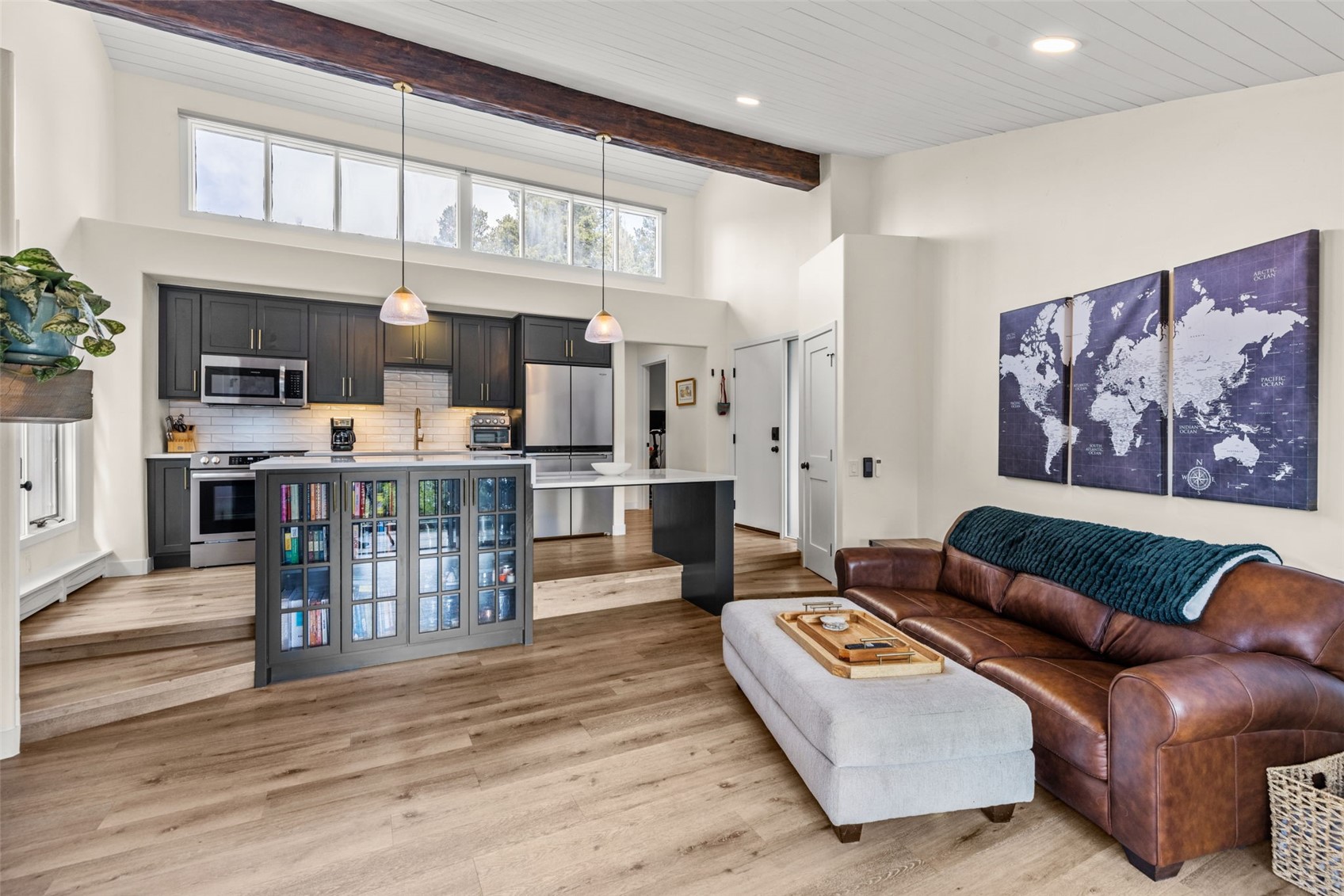 1127 Ski Hill Road, Unit 104 Breckenridge, CO 80424 - Photo 6 of 32 a living room with furniture and kitchen view