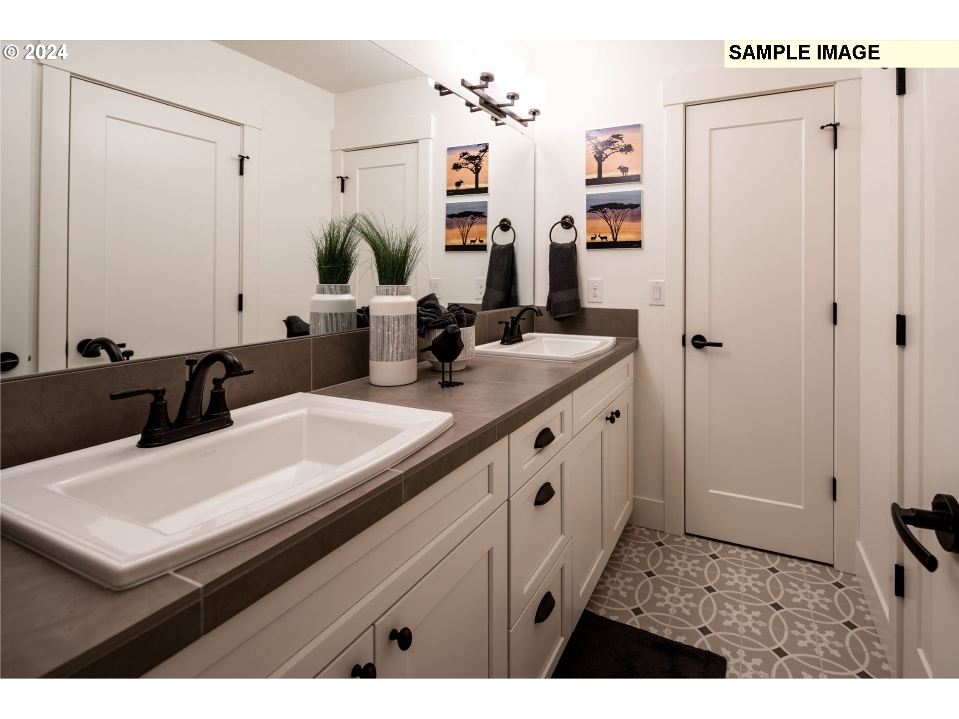 821 Northwest 178th Street Ridgefield, WA 98642 - Photo 24 of 24 a bathroom with a sink and a mirror