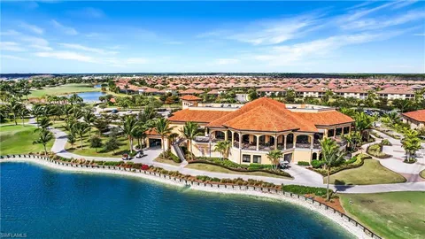 swimming pool with outdoor seating and yard