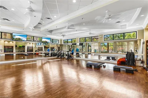 a outdoor space with lots of furniture and hardwood floor