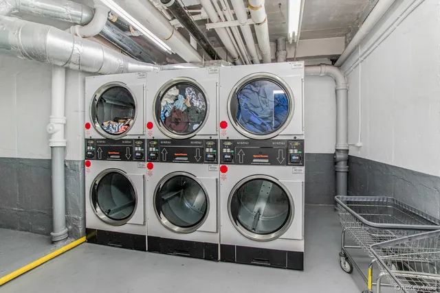 a utility room with dryer and washer