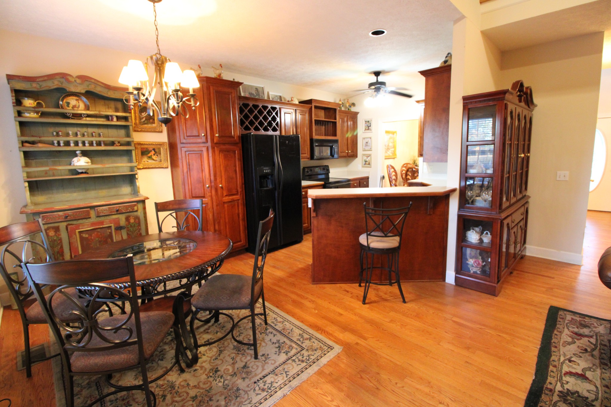 248 West Hester Road Cottontown, TN 37048 - Photo 11 of 22 a dining room filled with furniture and a chandelier