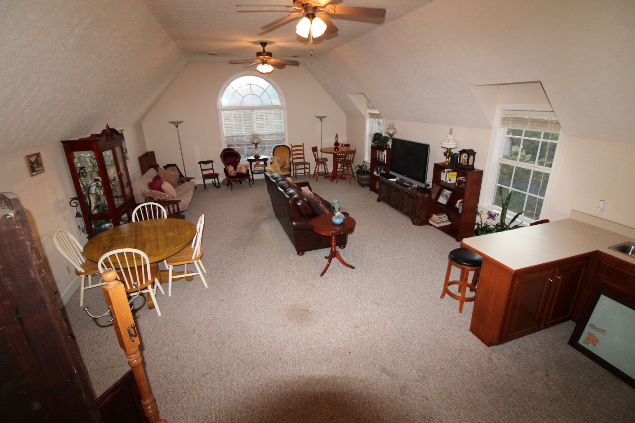 248 West Hester Road Cottontown, TN 37048 - Photo 17 of 22 a living room with furniture a flat screen tv and a large window